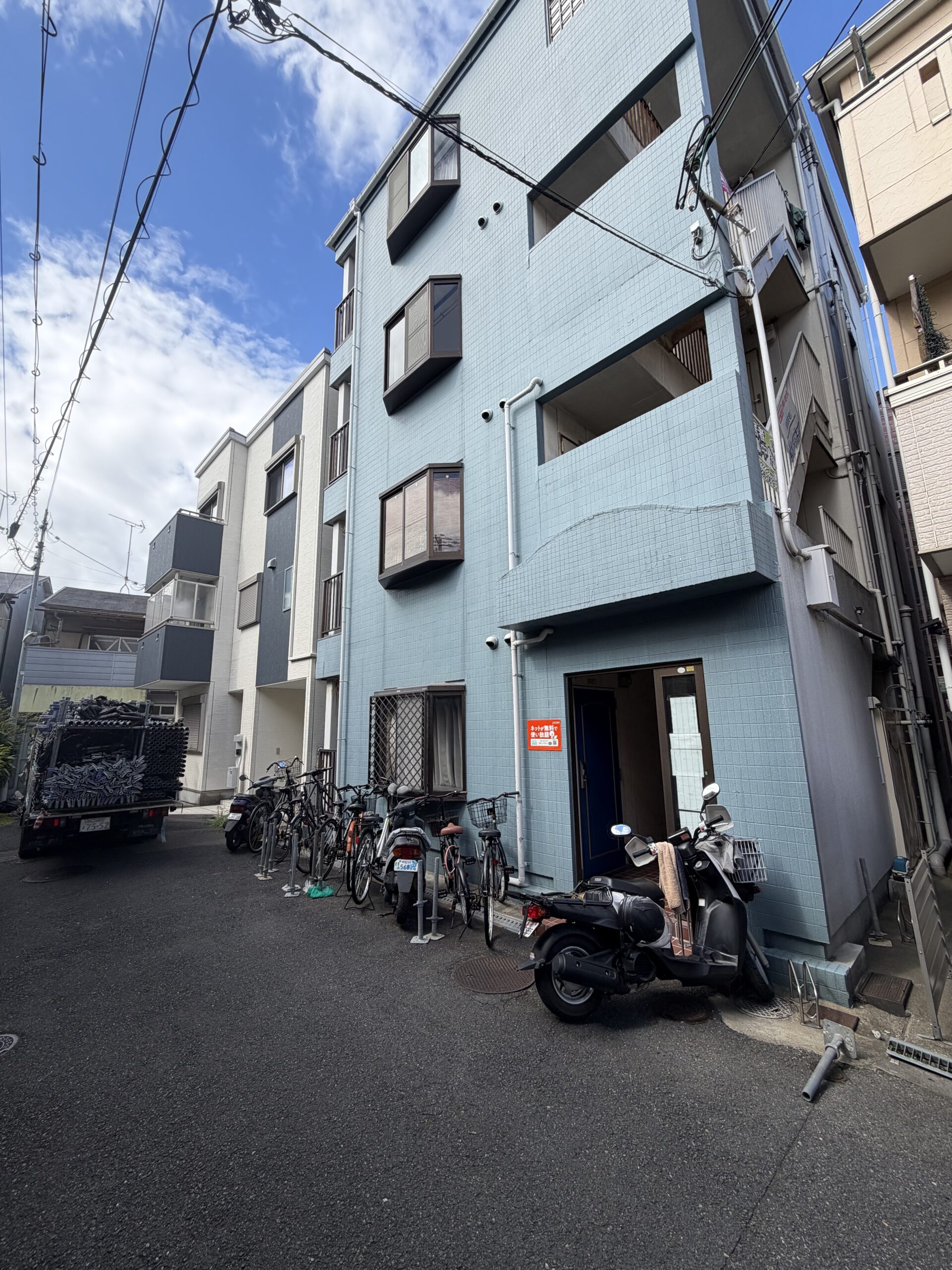 寝屋川市マンションの外壁タイル補修工事前の建物外観