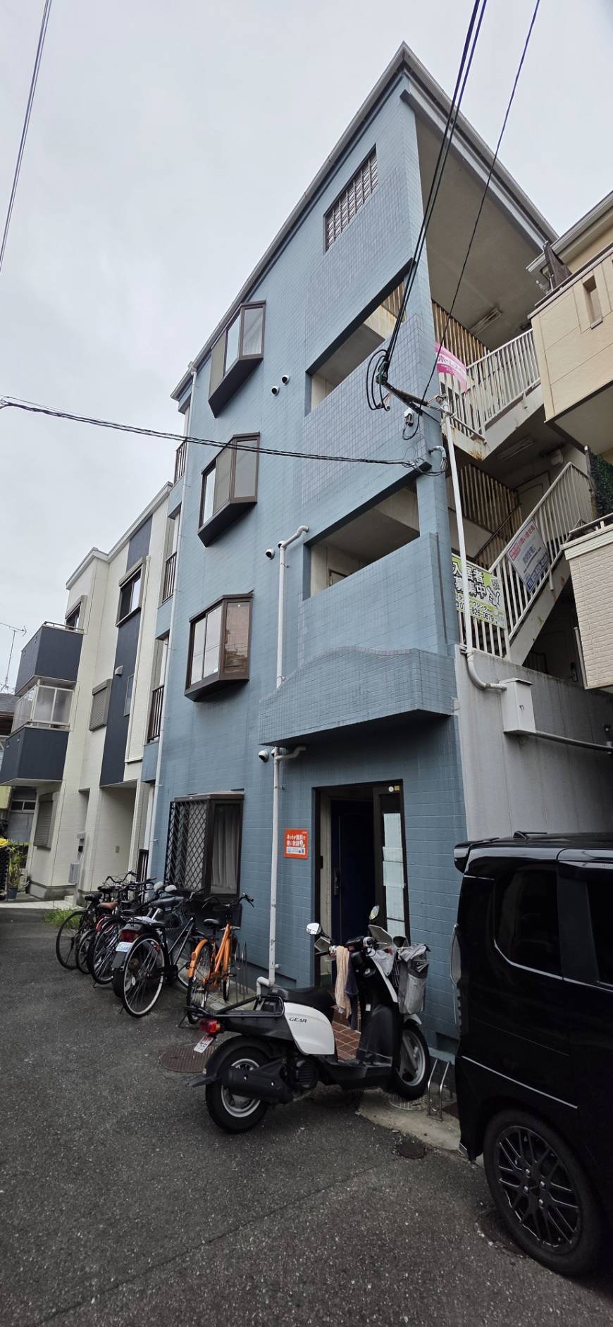寝屋川市マンションの外壁タイル補修完了後の建物全景